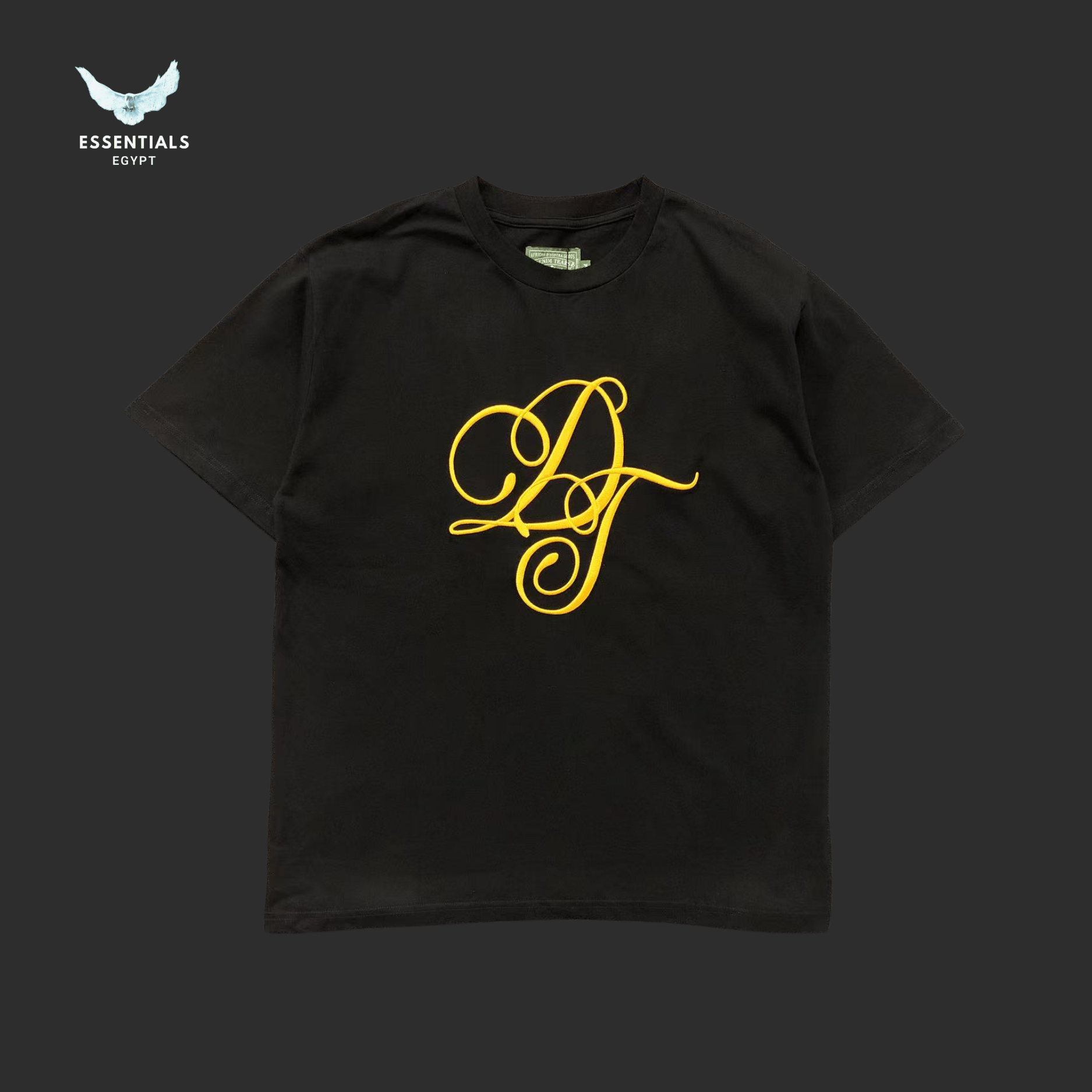Denim Tears T-Shirt – Monogram Logo Print - ESSENTIALS EGYPT