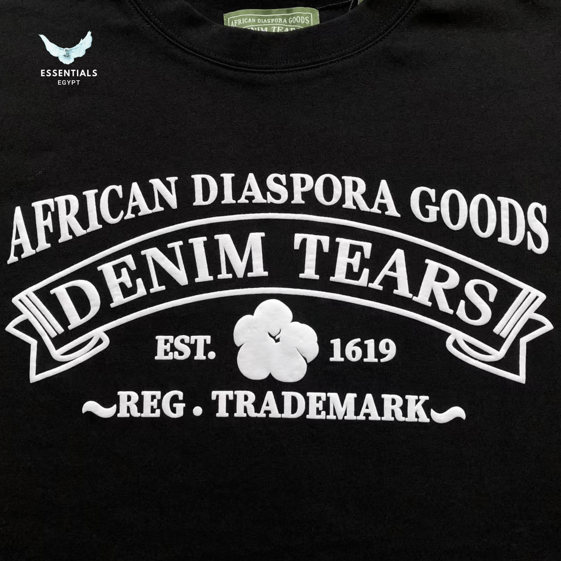 Denim Tears T-Shirt – Diaspora Goods Logo Print - ESSENTIALS EGYPT