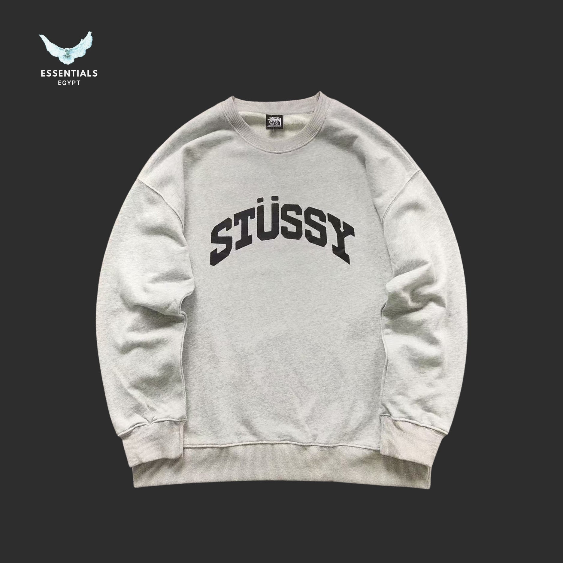 Gray Stussy sweatshirt on a black background
