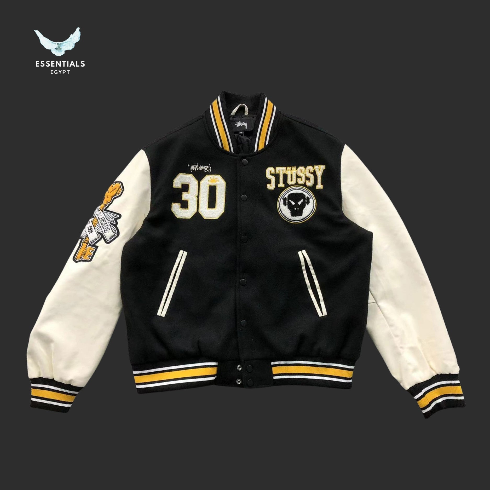 Stussy College Varsity Jacket 30 Patch in black with white sleeves