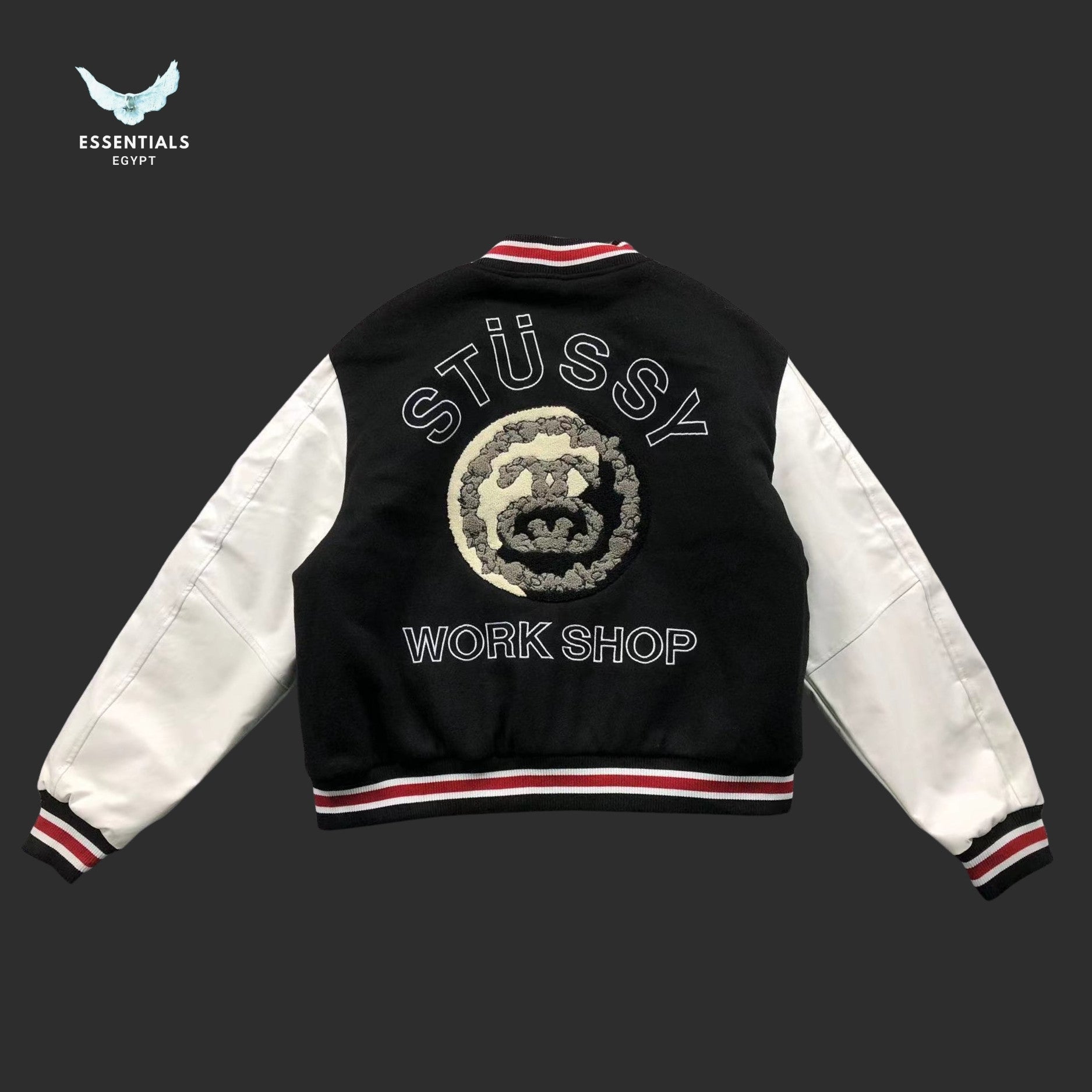 Stussy 80 Patch Varsity Jacket in black with white sleeves